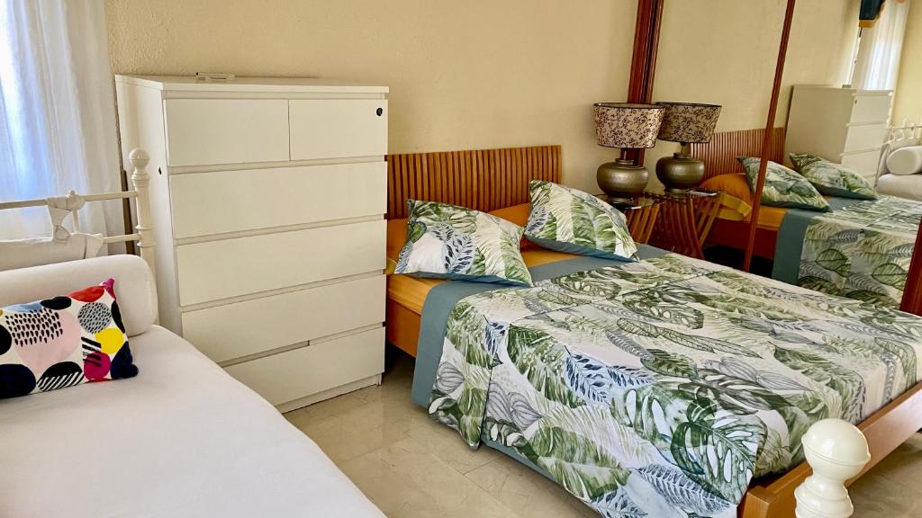 Postel nebo postele na pokoji v ubytování H1-Habitación sublime cama doble luminosa A/C WIFI