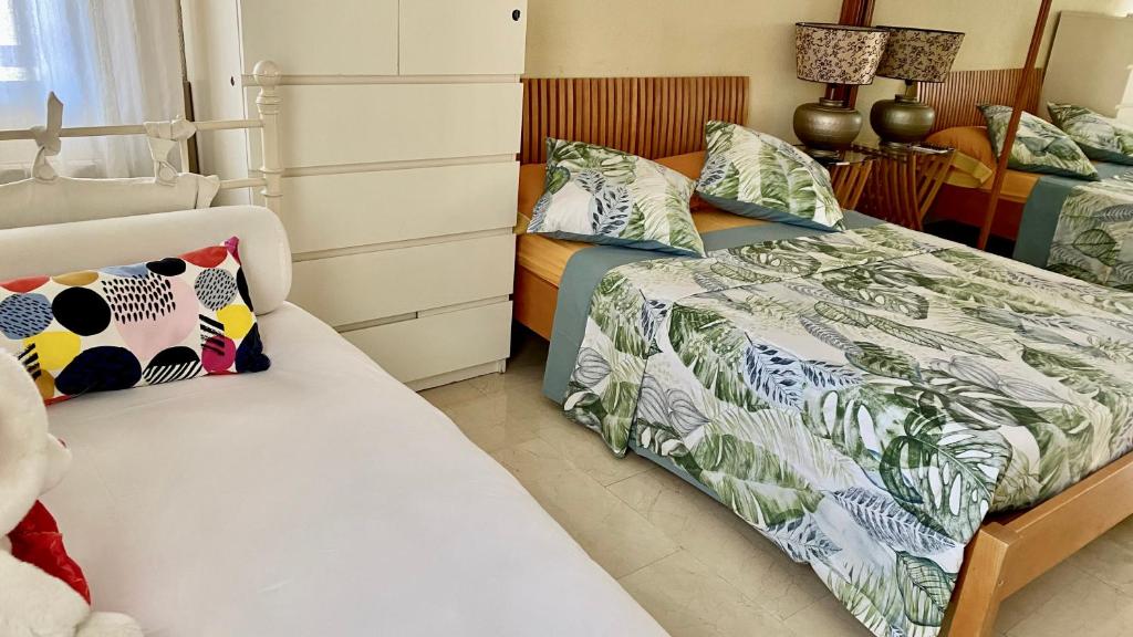 Postel nebo postele na pokoji v ubytování H1-Habitación sublime cama doble luminosa A/C WIFI