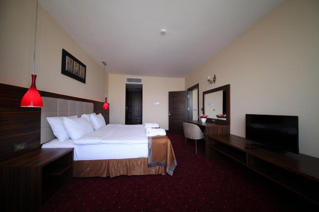 Postel nebo postele na pokoji v ubytování Safa Sorgun Thermal Hotel