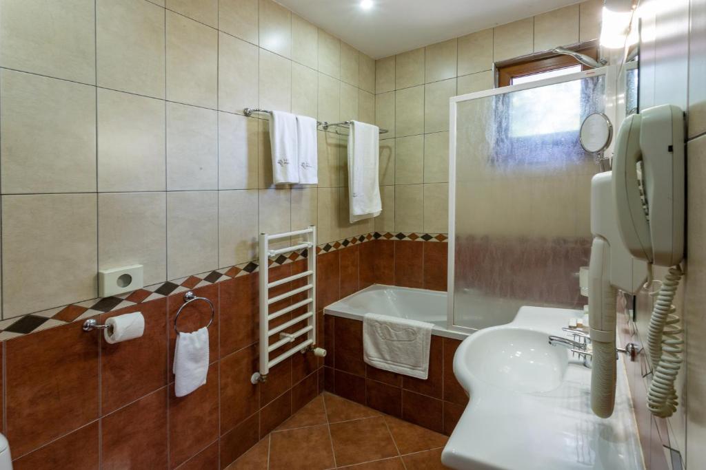 Koupelna v ubytování Musala Hotel