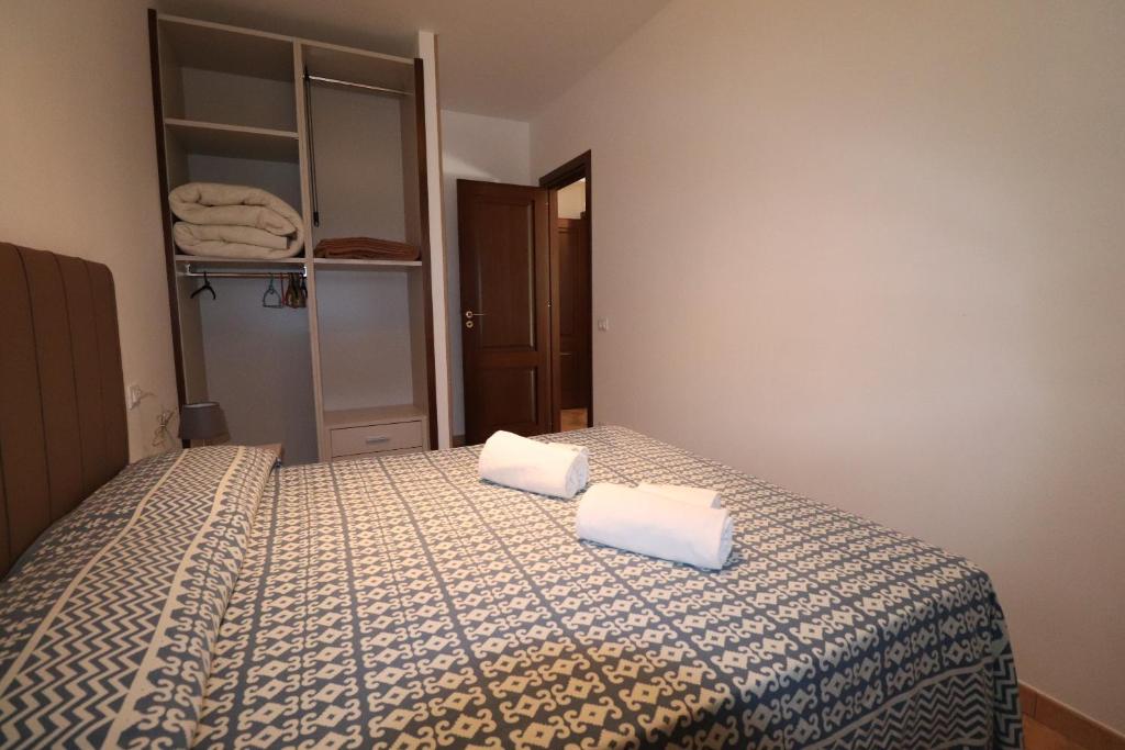 Posteľ alebo postele v izbe v ubytovaní casa Vincenzo