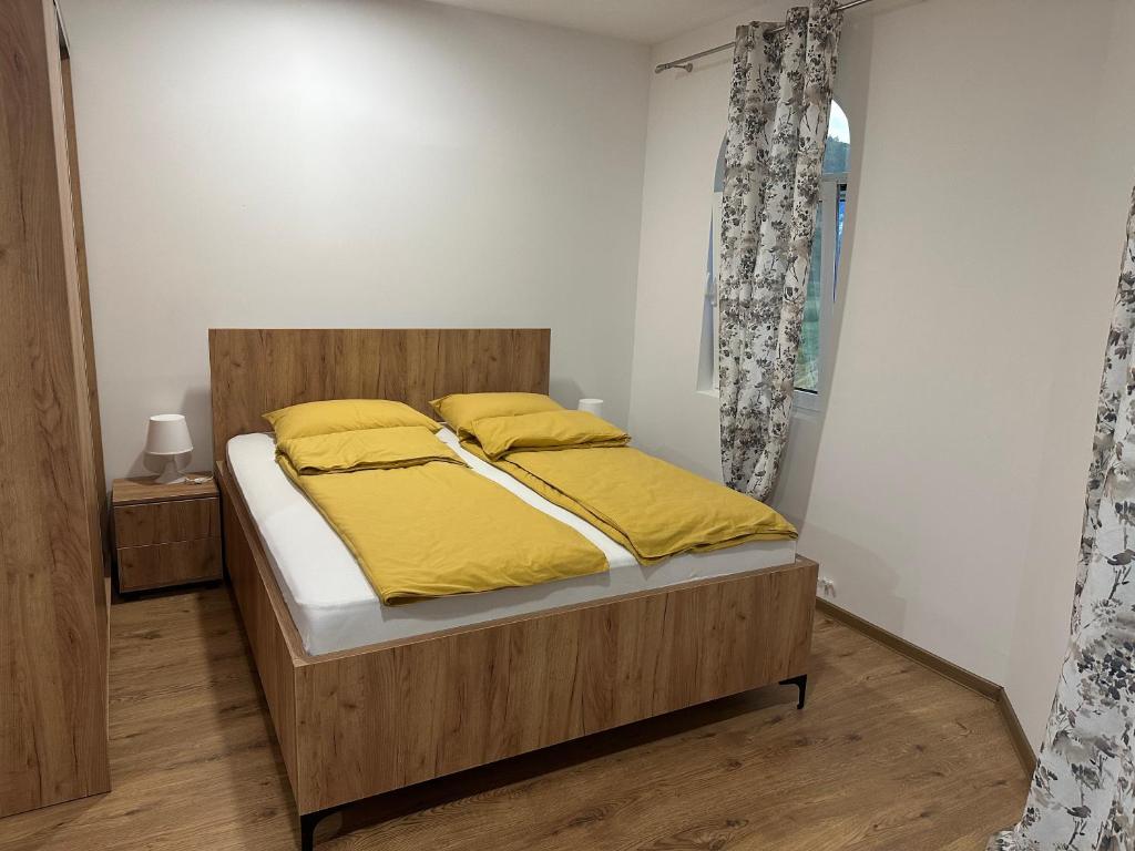 Postel nebo postele na pokoji v ubytování Apartmani BMD