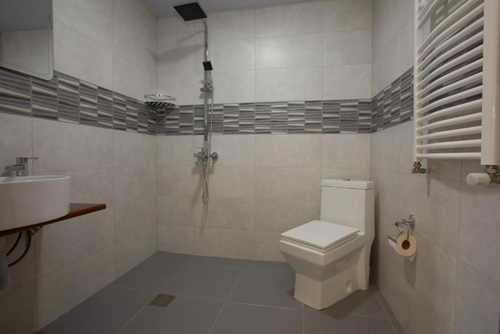 Koupelna v ubytování Hotel Mansarda Mestia