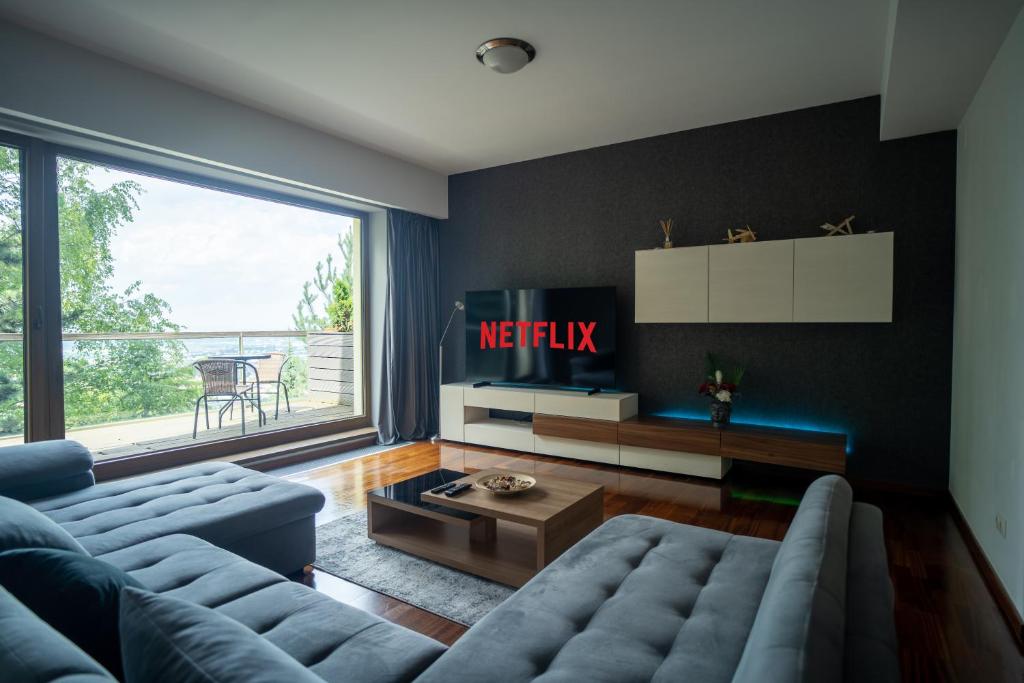 Ruang duduk di With a View Residence - Luxury Apartament - Panoramic view over the City