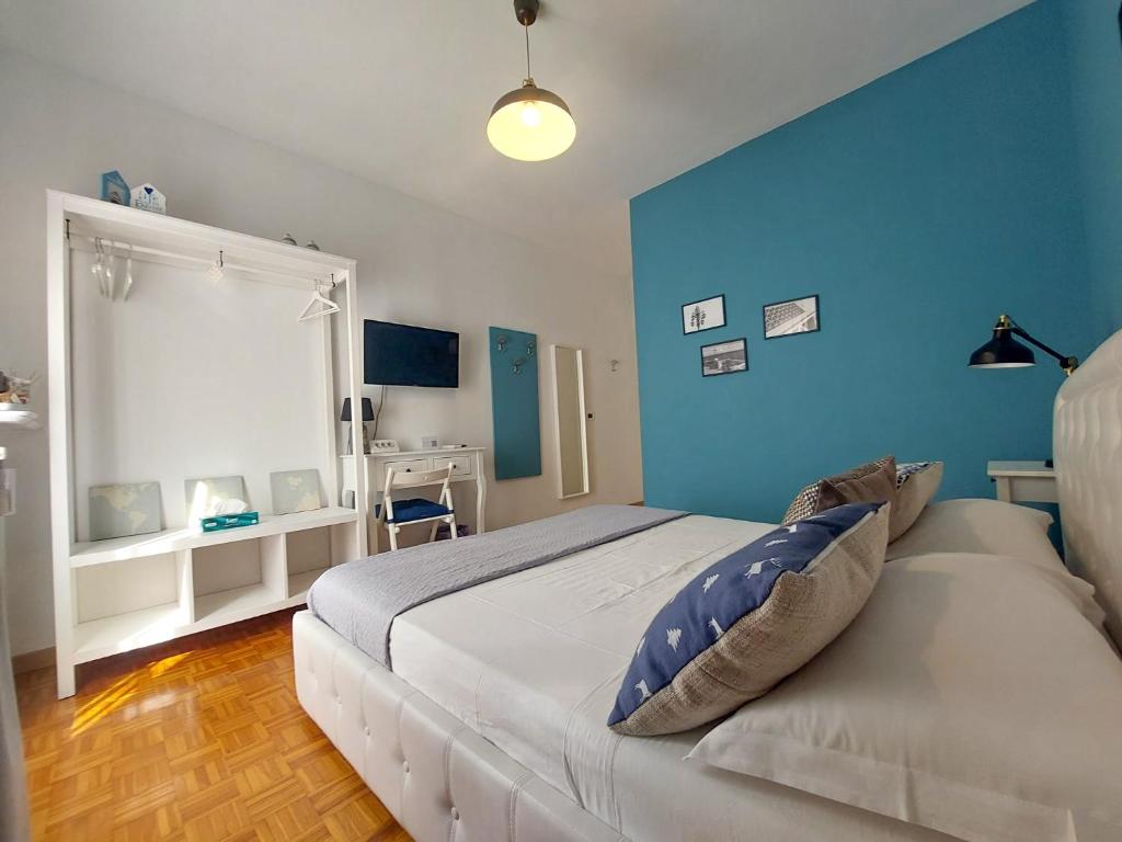 Letto o letti in una camera di MyWay Trieste Rooms