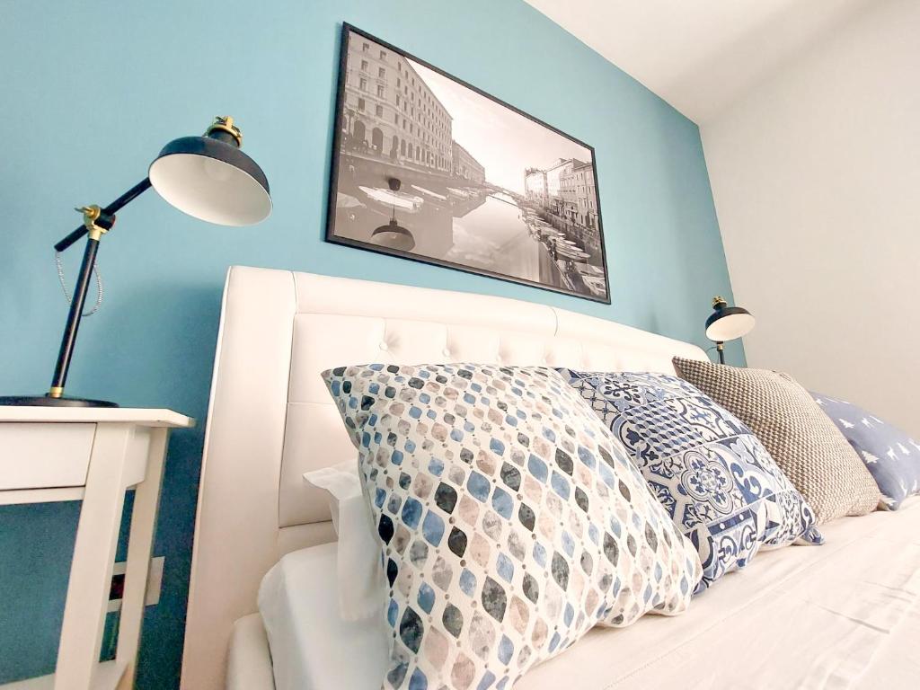Letto o letti in una camera di MyWay Trieste Rooms