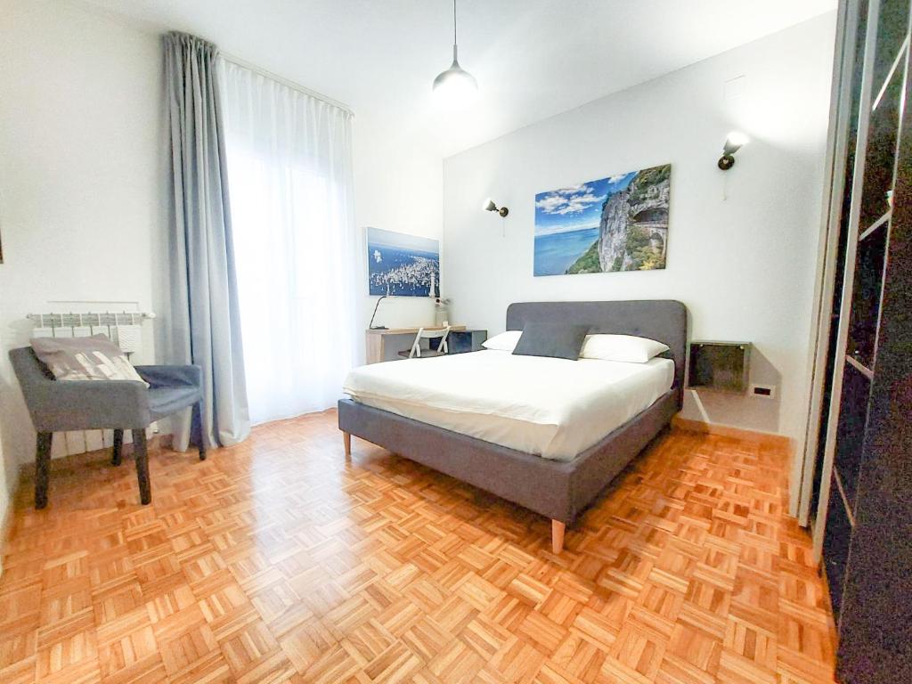 Letto o letti in una camera di MyWay Trieste Rooms