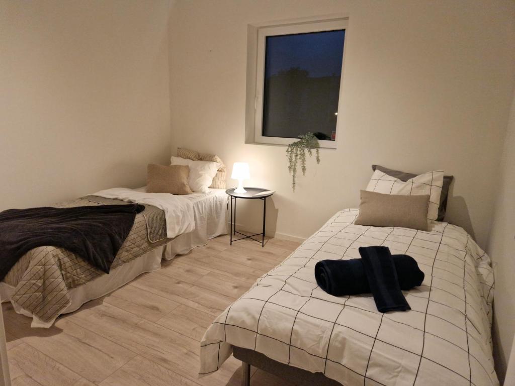 Postel nebo postele na pokoji v ubytování Lorans