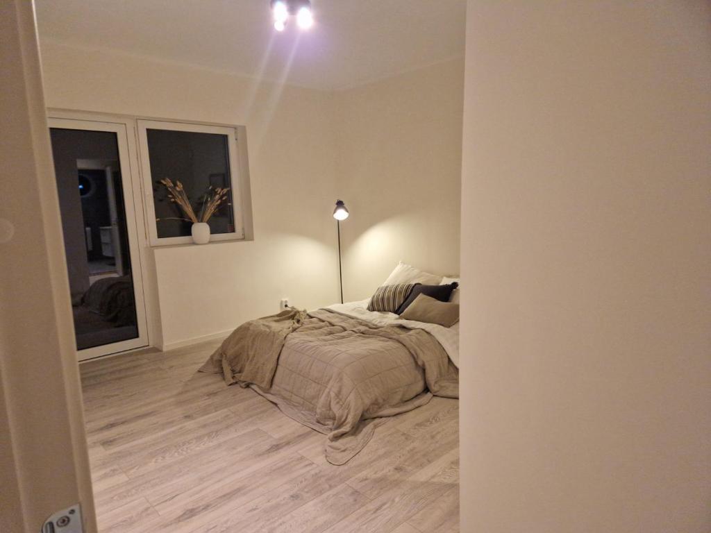 Postel nebo postele na pokoji v ubytování Lorans