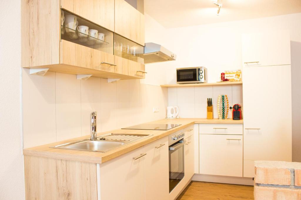 Kuchyň nebo kuchyňský kout v ubytování Ferienwohnung Hilber