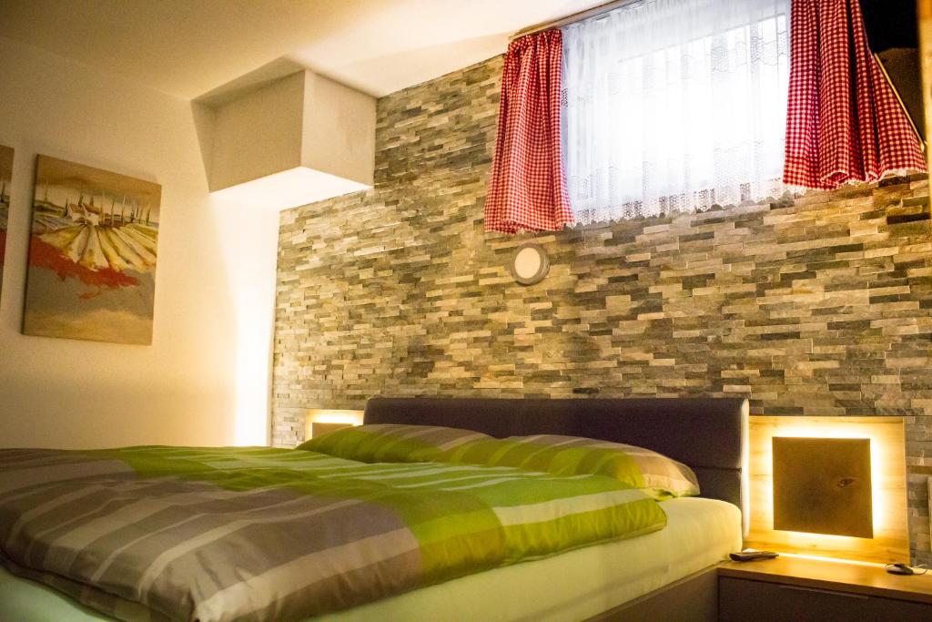 Postel nebo postele na pokoji v ubytování Ferienwohnung Hilber