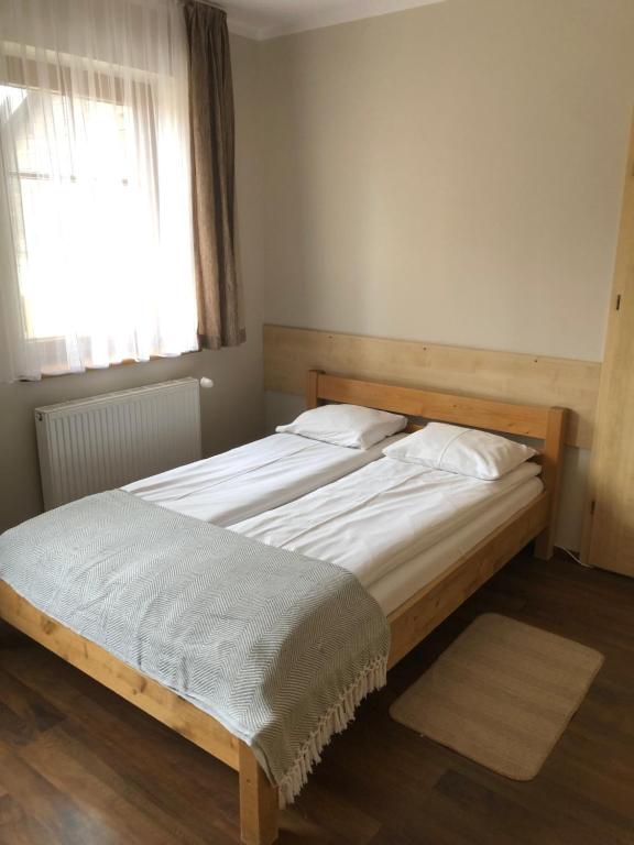 Posteľ alebo postele v izbe v ubytovaní Śnieżka