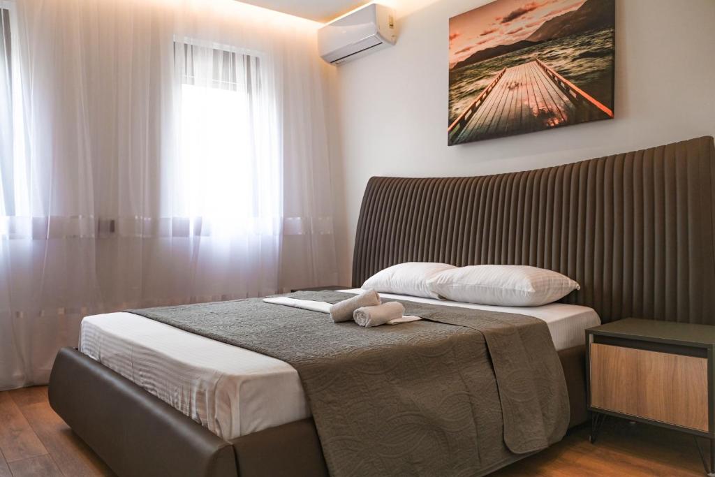 Postel nebo postele na pokoji v ubytování B&B Lovac Hasa 2