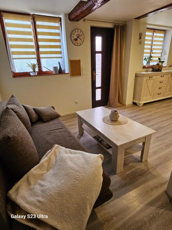 Posezení v ubytování Ferienwohnung ,,Hinter der Mauer''