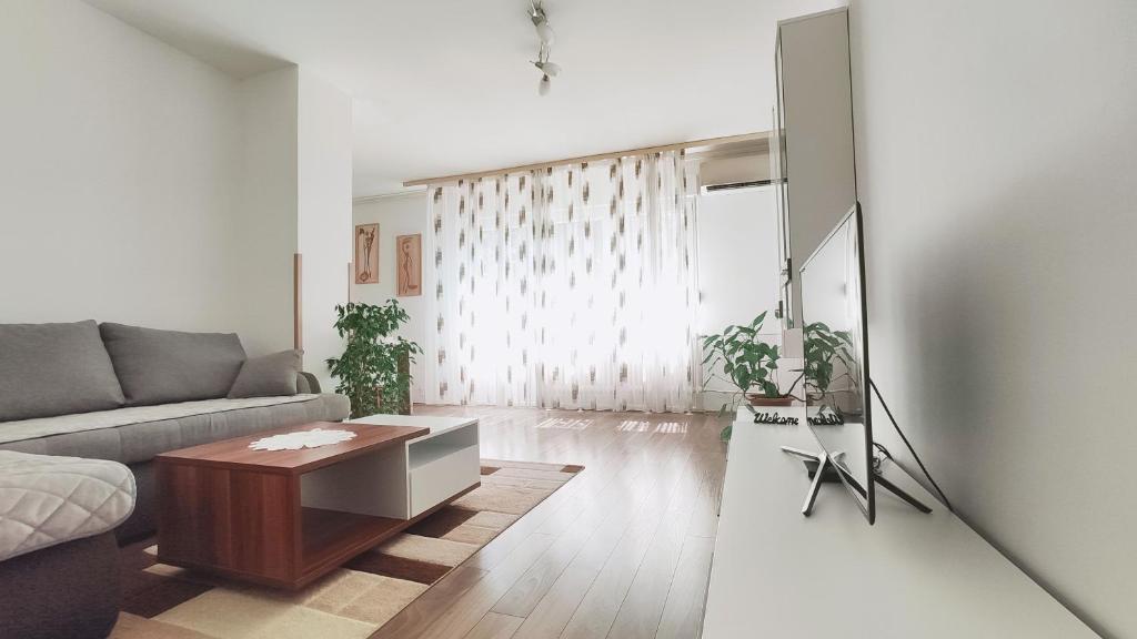 Televízia a/alebo spoločenská miestnosť v ubytovaní Plitvice Apartment