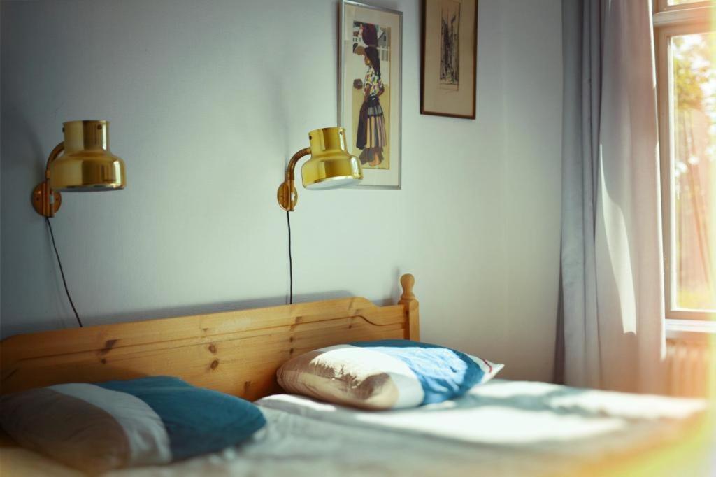 Postel nebo postele na pokoji v ubytování Piece of Hjo Vandrarhem