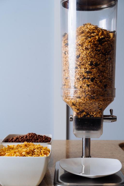a food processor filled with nuts on a table at Cris Hotel in Florianópolis