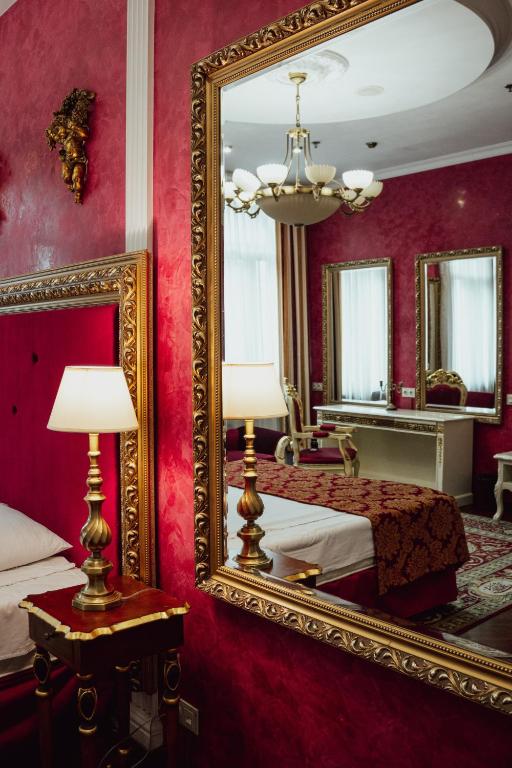 Koupelna v ubytování De Paris Hotel