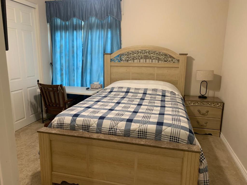 Postel nebo postele na pokoji v ubytování LuxHome Suites in Mansion