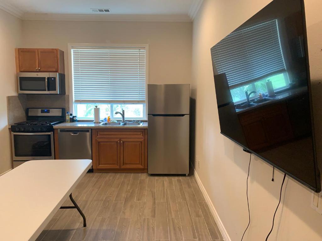 Kuchyň nebo kuchyňský kout v ubytování LuxHome Suites in Mansion