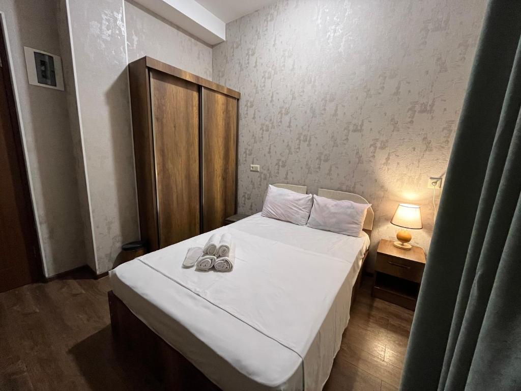 Postel nebo postele na pokoji v ubytování Hotel Goldenera