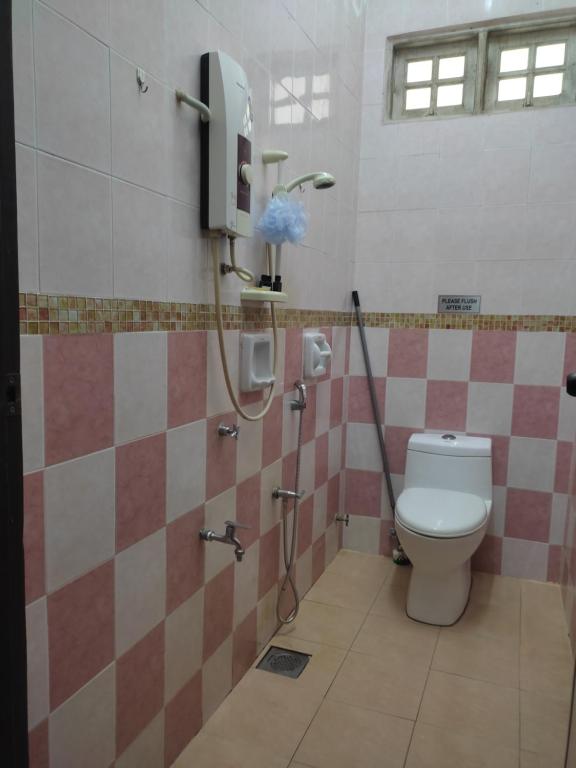 Koupelna v ubytování Megat Homestay