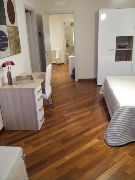Posteľ alebo postele v izbe v ubytovaní Residenza Piazza Moro