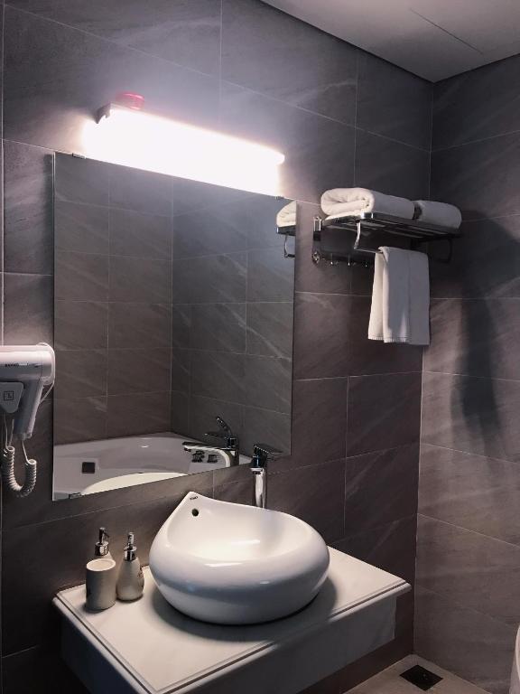Koupelna v ubytování Rosy Hotel Dương Nội
