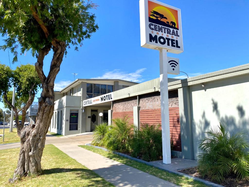 a sign for a central motel in front of a building at Central Motel Mildura in Mildura
