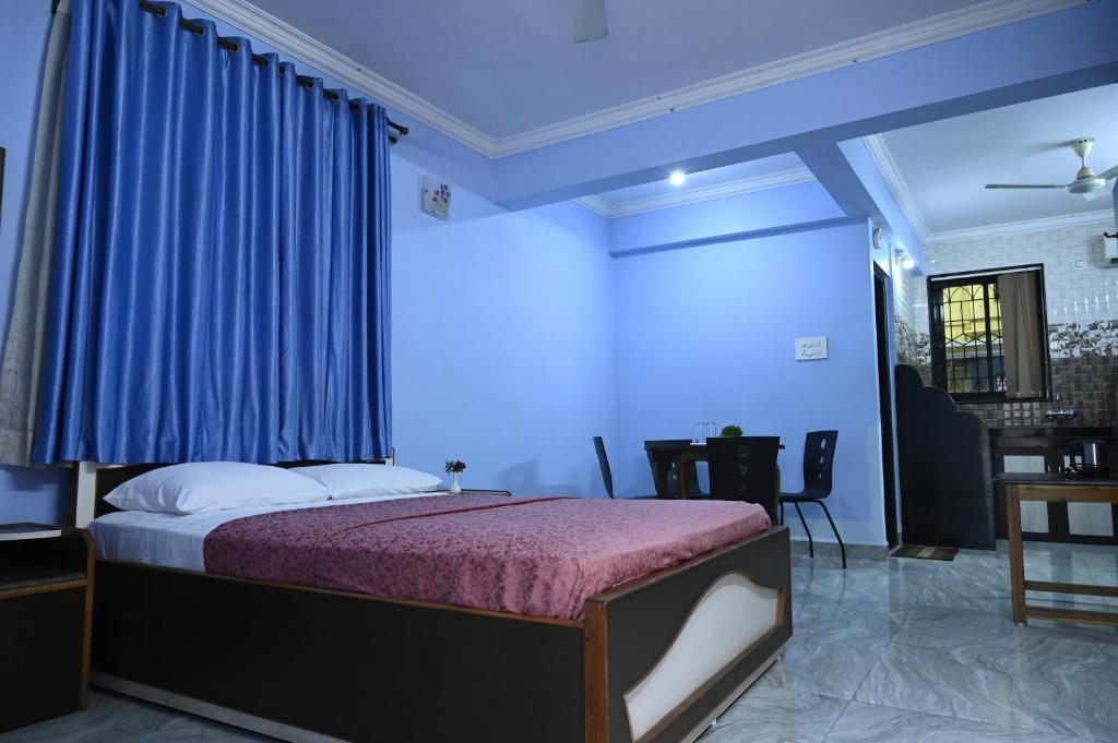 Postel nebo postele na pokoji v ubytování Hotel Siesta De Goa