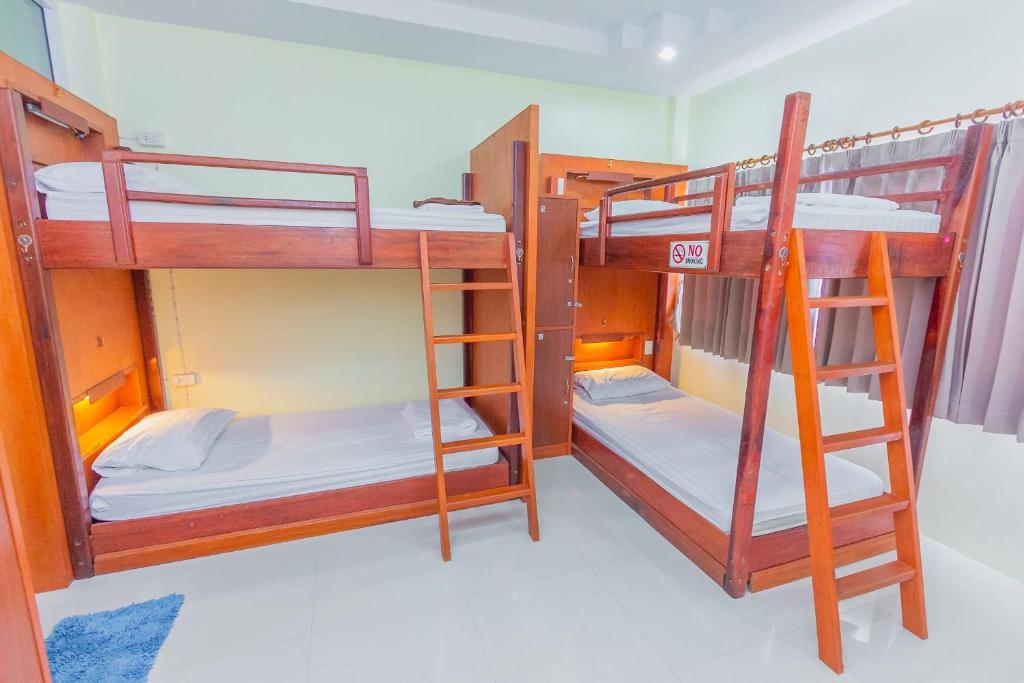 Postel nebo postele na pokoji v ubytování Phangan Barsay Hostel
