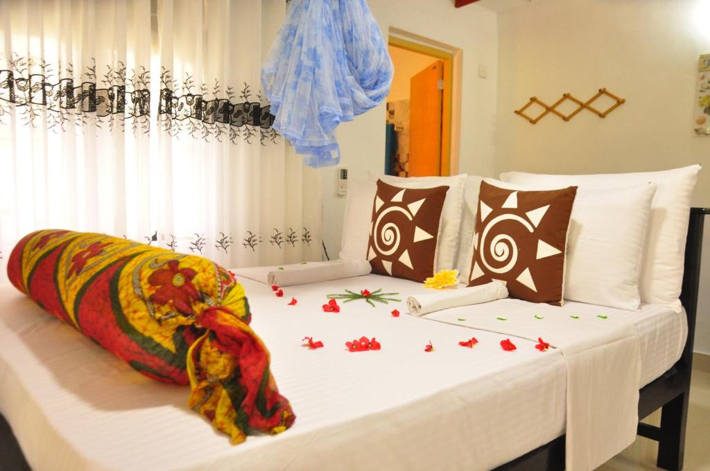 Postel nebo postele na pokoji v ubytování Another World Hostel Sigiriya
