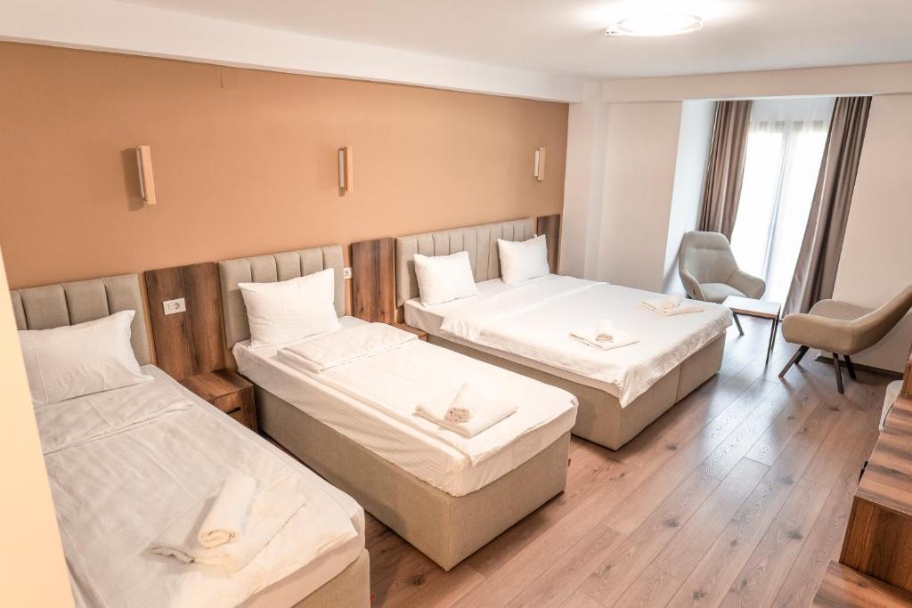 Postel nebo postele na pokoji v ubytování Hotel Diamond