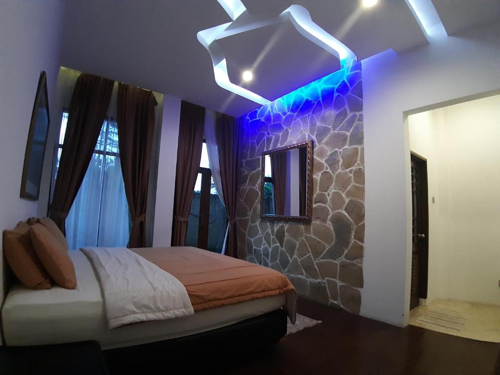 Postel nebo postele na pokoji v ubytování Villa Eaden