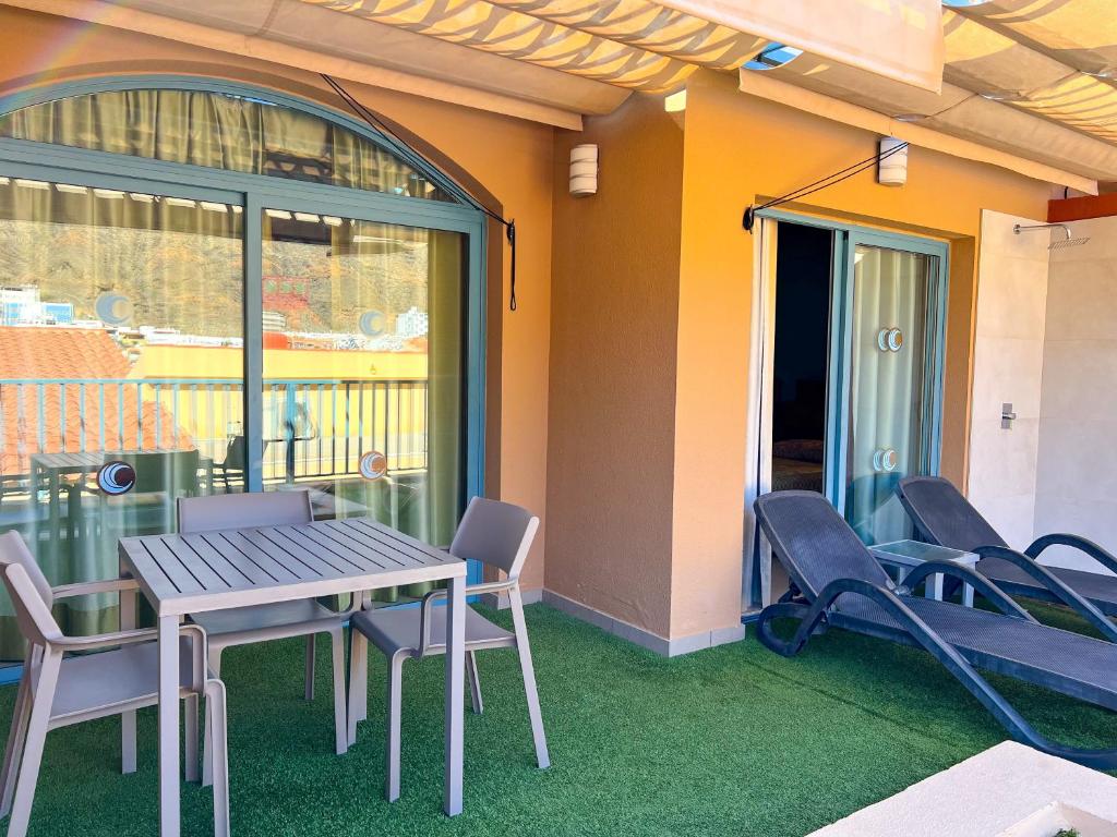A patio or other outdoor area at Apartamentos Cordial Mogán Valle