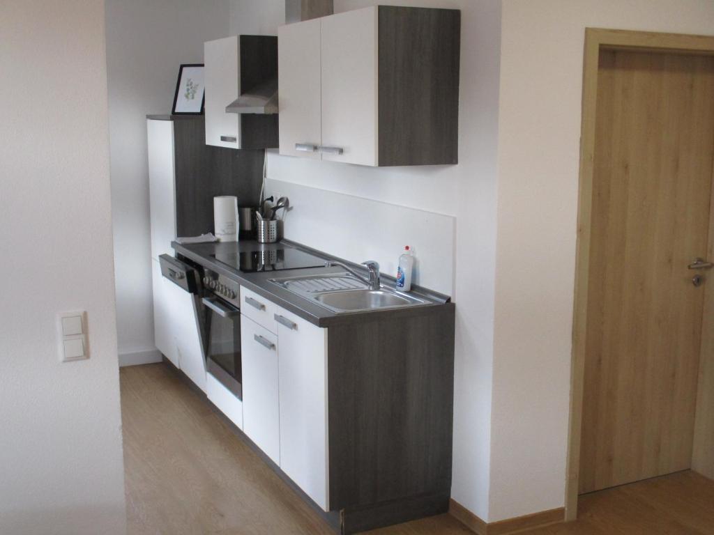 Kuchyň nebo kuchyňský kout v ubytování Parsberger Stadtwohnung