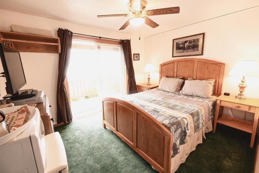 Katil atau katil-katil dalam bilik di Front Room Lynnview Lodge