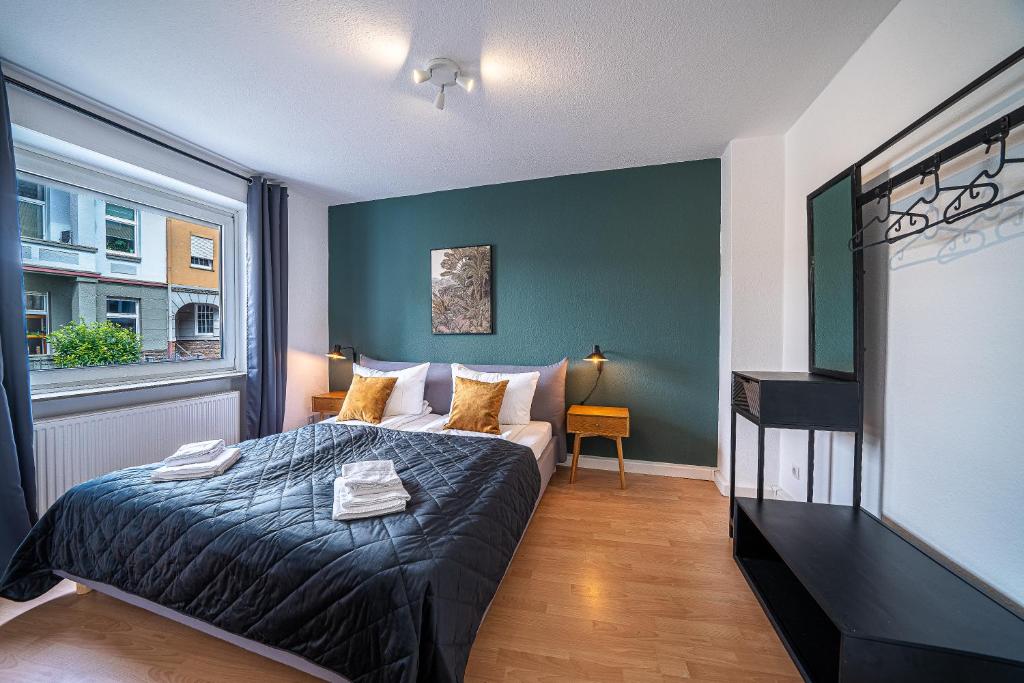 En eller flere senger på et rom på FRA01: Design Apartment Koblenz City - WLAN - 2 Bedrooms