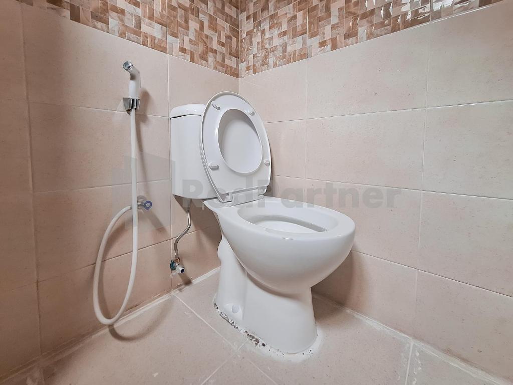 Koupelna v ubytování Adam Guesthouse Mitra RedDoorz