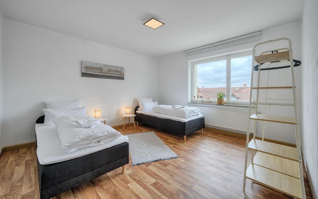 Postel nebo postele na pokoji v ubytování Select-Home 3 - Netflix - Parkplatz - Business Home
