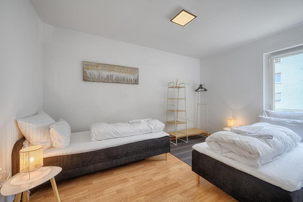 Postel nebo postele na pokoji v ubytování Select-Home 3 - Netflix - Parkplatz - Business Home