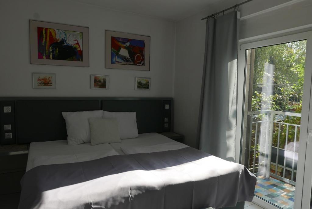 Posteľ alebo postele v izbe v ubytovaní ROOMS BYTOM
