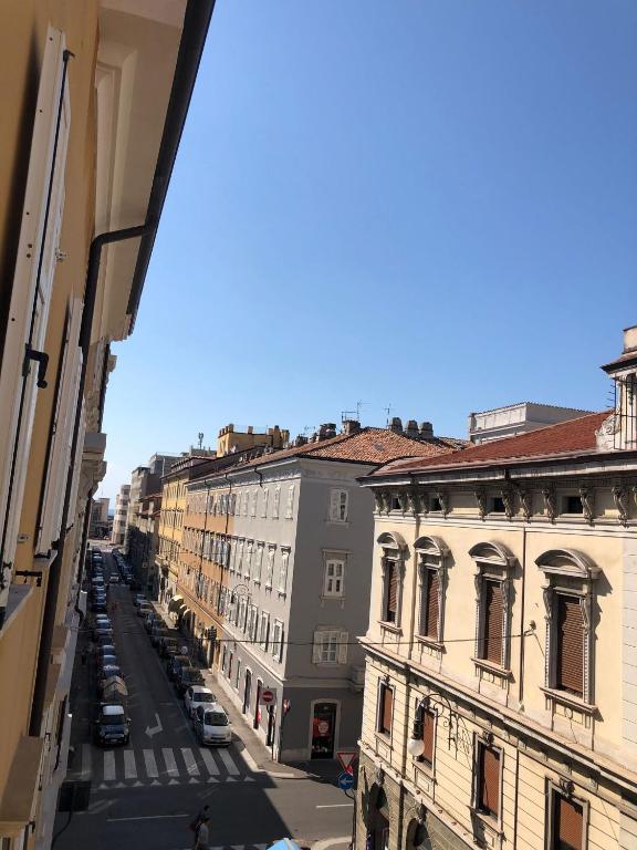 a view of a city street from a building at Le Maldobrie in Trieste