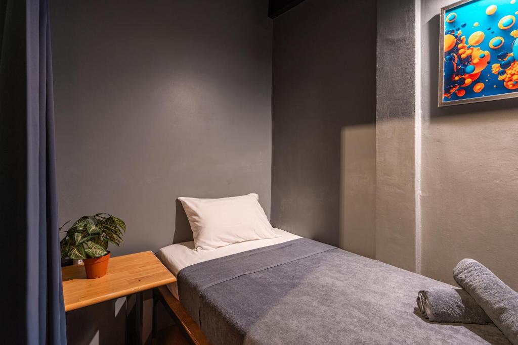 Postel nebo postele na pokoji v ubytování Black Panther Hostel