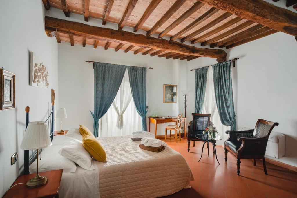 Postel nebo postele na pokoji v ubytování Villa La Cappella