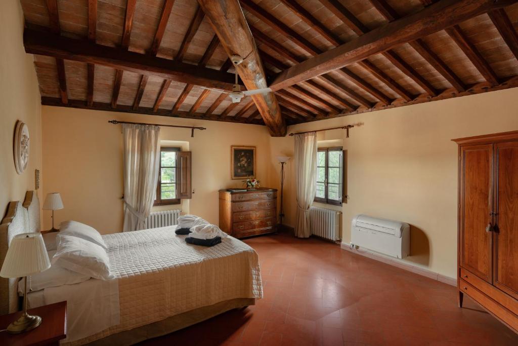 Postel nebo postele na pokoji v ubytování Villa La Cappella