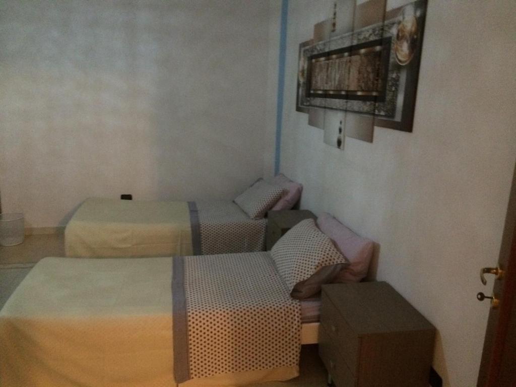 Postel nebo postele na pokoji v ubytování B&B Camelie