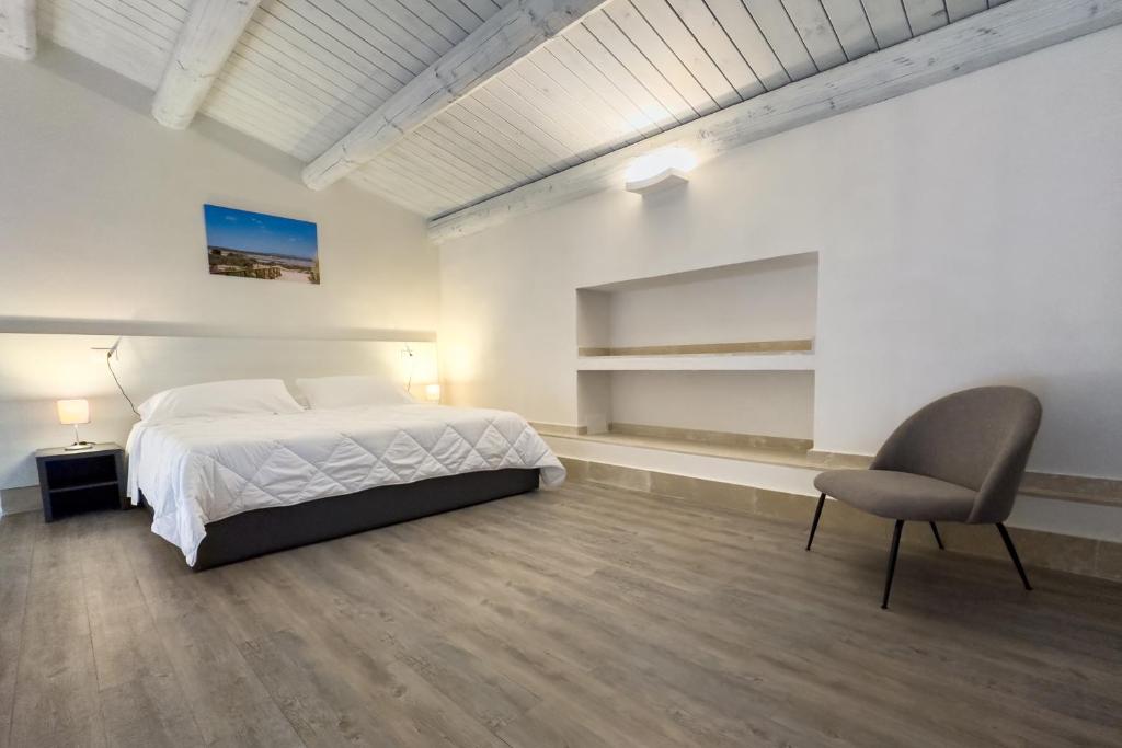 Postel nebo postele na pokoji v ubytování Borgo Vita Novella Resort