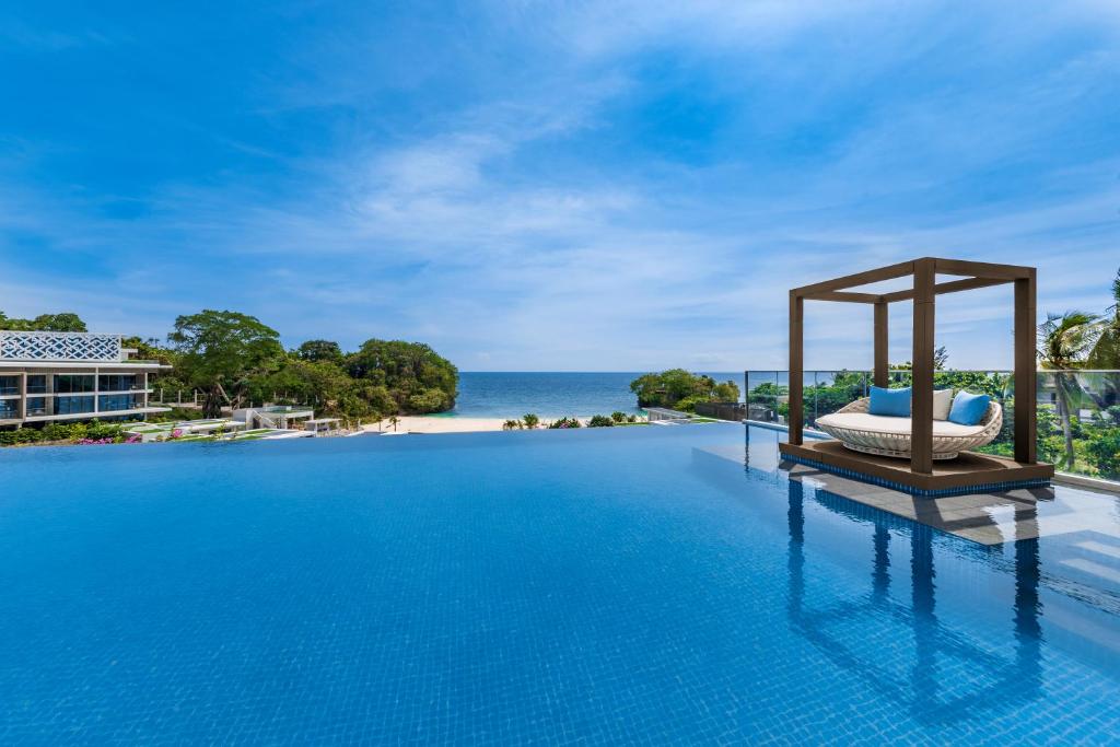 a pool at a resort with a gazebo at Crimson Resort and Spa Boracay in Boracay