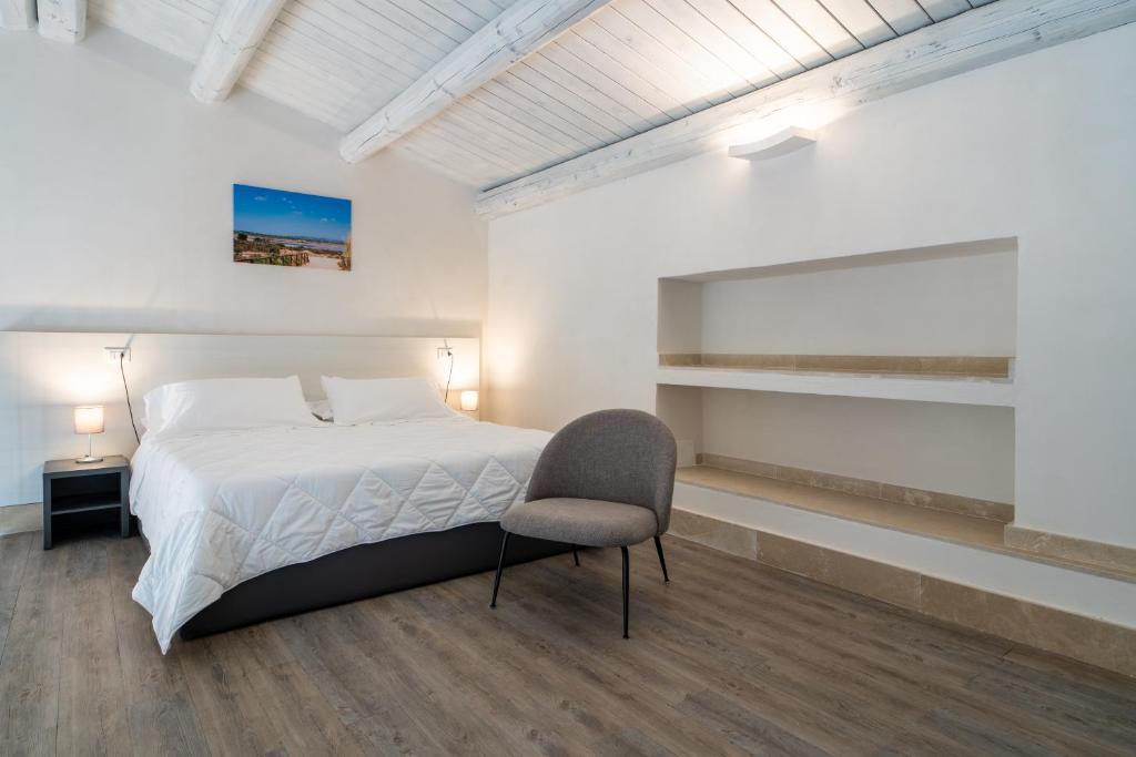 Postel nebo postele na pokoji v ubytování Borgo Vita Novella Resort